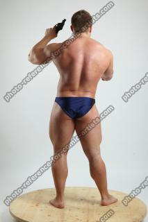 2021 01 ADAM WARD STANDING WITH TWO GUNS (6)